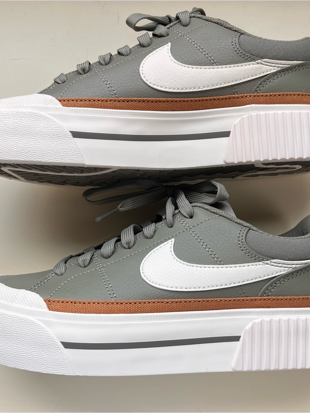 Nike Women's Court Lift Shoes in light army color. Platform style.